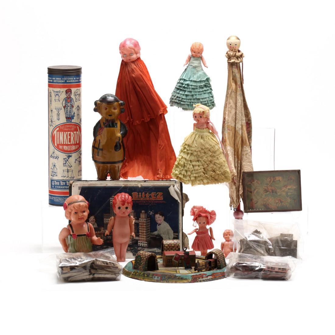 A Group of Vintage Toys: to include: celluloid dolls and carnival favors, featuring Betty Boop (5.75 in.); a Betty wind-up tin toy by Lindstrom, 1930s (8 in.) (working condition); a child's parasol; a tinker toy set in tube;