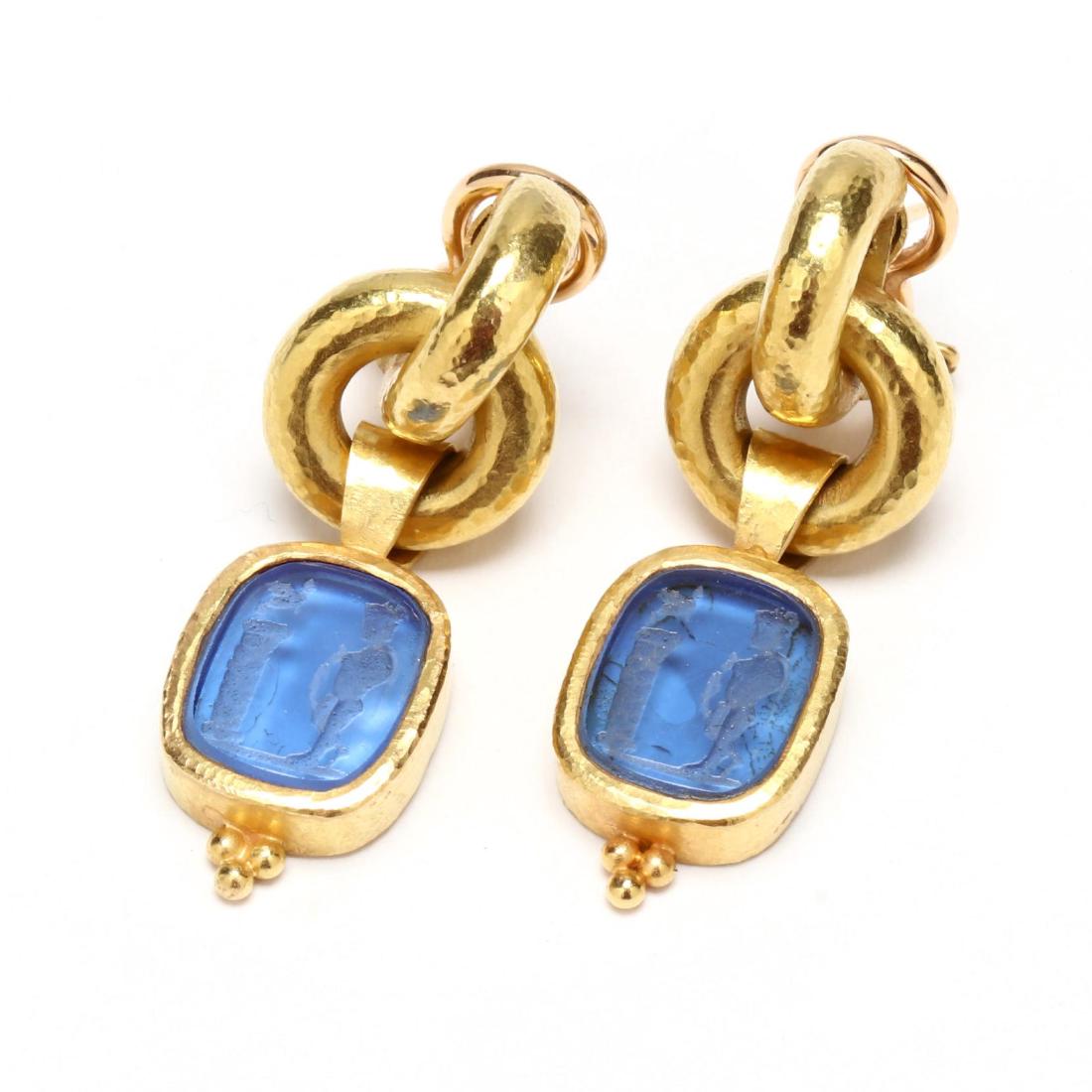 18KT Gold and Intaglio Earrings, Elizabeth Locke: the bezel set rectangular intaglio depicting Oedipus encountering Sphinx at Thebes suspended from a round ring with a half hoop surmount, completed with post and Omega clip back, marked 18KT and with 