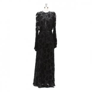 Elegant Designer Gown, Thea Porter: made in England, a floor length gown composed of velvet flocked chiffon, long sleeves terminating in small cuffs with hook and eye closure, the front has hook and eyes above a zipper over peplum at th