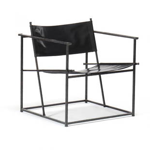 Jacques Garcia (French, b.1947),  Auguste  Lounge Chair: Baker, contemporary, hammered and patinated iron frame with stitched black leather upholstery, labeled. 30 x 28 x 28 in. Private Collection, Raleigh, NC. Additional high-resolution photos are availabl