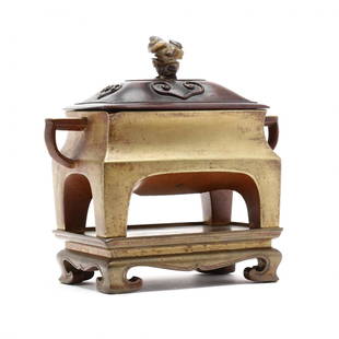 A Chinese Rectangular Bronze Censer with Stand and: 19th century, with apocryphal Xuande mark on underside of censer, with a pair of ear form handles bracketing the waisted neck and all resting on four thick supports, the censer stands on a base raised