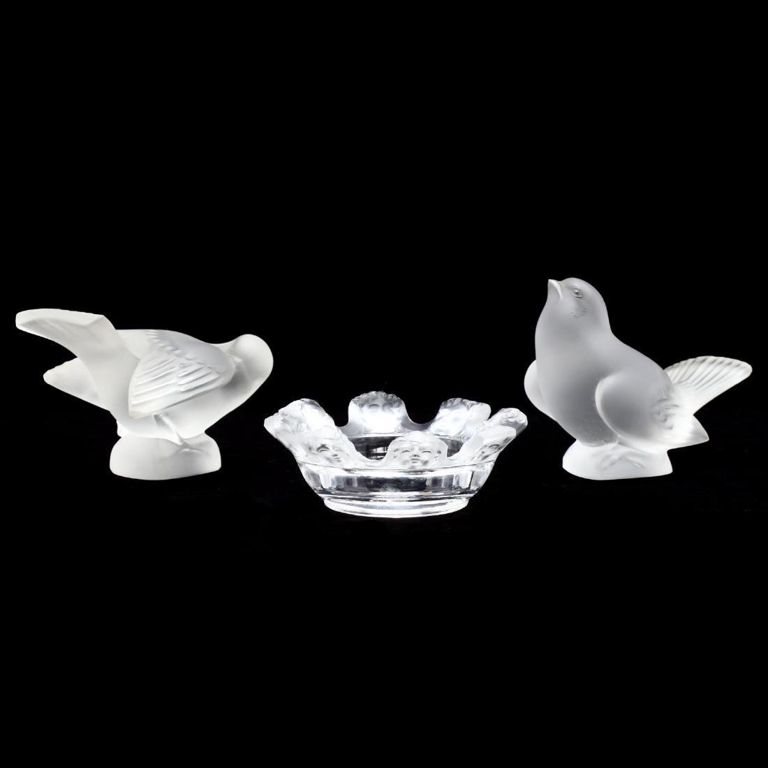 Lalique, Three Signed Crystal Decorative Objects: 20th century, to include two frosted doves and St. Nicholas ashtray, all marked. Tallest 3 x 4.5 in. From The Collection of the Late Stuart Walston and Doris Schaum Walston of Wilson, North Carolina A