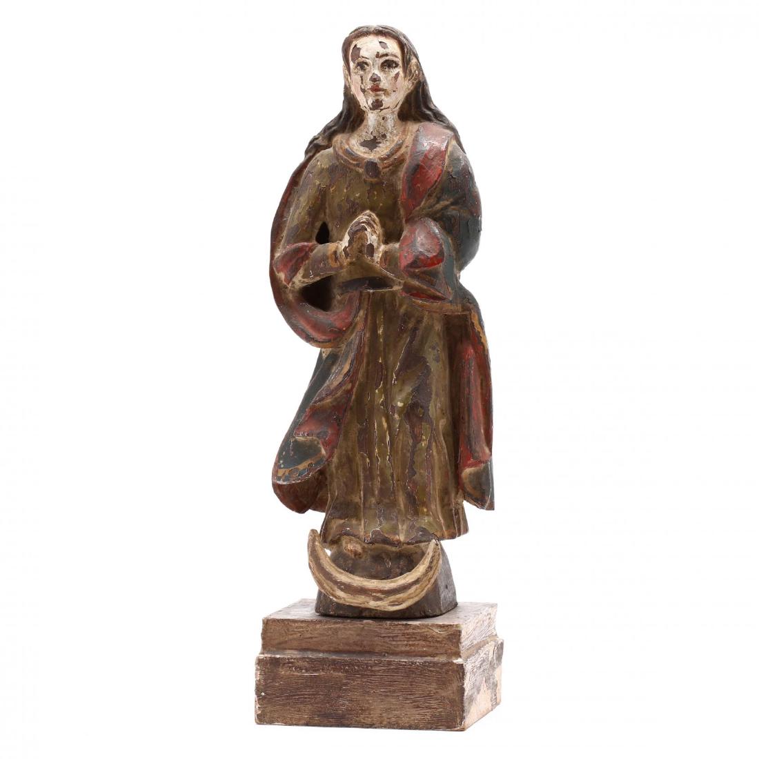 Spanish Carved and Polychrome Painted Figure of the: 19th century, figure shown with hands in prayer atop a crescent moon, on wood plinth. HOA 11.75 in. From The Collection of the Late Stuart Walston and Doris Schaum Walston of Wilson, North Carolina Ad