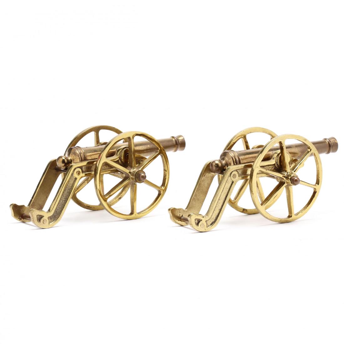 Pair of Decorative Desk Top Brass Cannons: late 20th century. 5 in. From The Collection of the Late Stuart Walston and Doris Schaum Walston of Wilson, North Carolina Additional high-resolution photos are available at LelandLittle.com