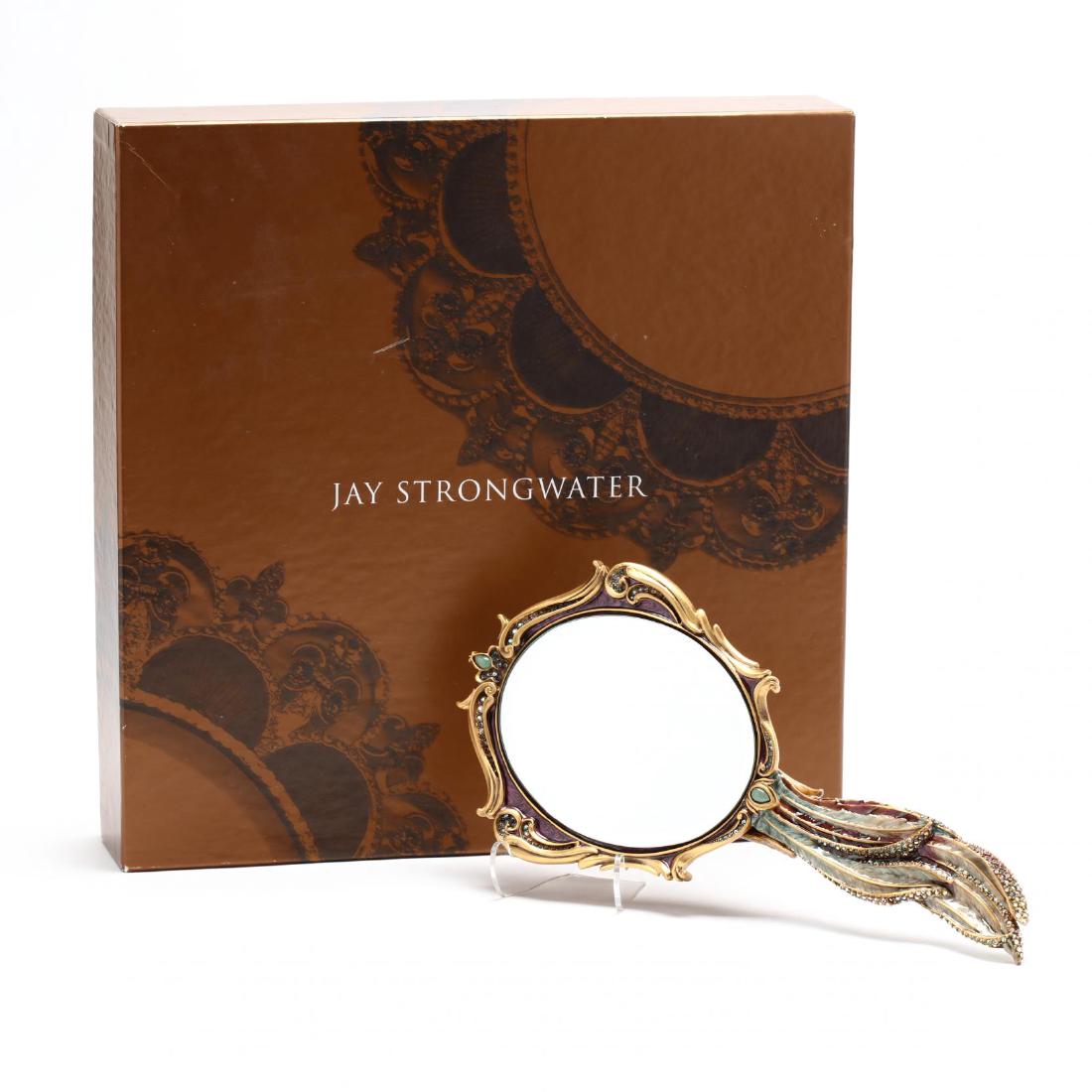 Enamel and Bejeweled "Peacock" Hand Mirror, Jay: in multi color enamel and Swarovski crystals throughout, the reverse with floral landscape and an applied finely detailed peacock. 11 x 5 in. With presentation box and dust cover. Additional high-res