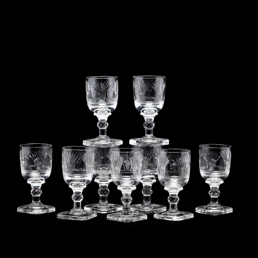 Nine Anglo Irish Cut Glass Stems: 19th century, cup cut with grass basket motif, diamond cut knop, square foot with canted corners, polished pontils. 4.5 in. Additional high-resolution photos are available at LelandLittle.com