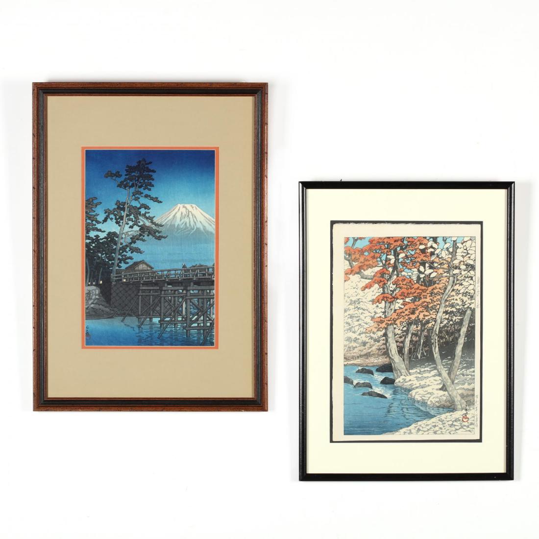 Two Woodblock Prints by Kawase Hasui (Japanese,: includes Autumn of Okuirise, circa 1930s, signed Kawase with red artist's seal Sui, title in margin on right side of print, Watanabe 6 mm seal in lower right corner, tall autumn trees over a running b