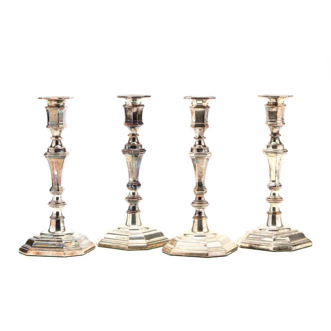 A Set of Four Silverplate Candlesticks (1 of 3)