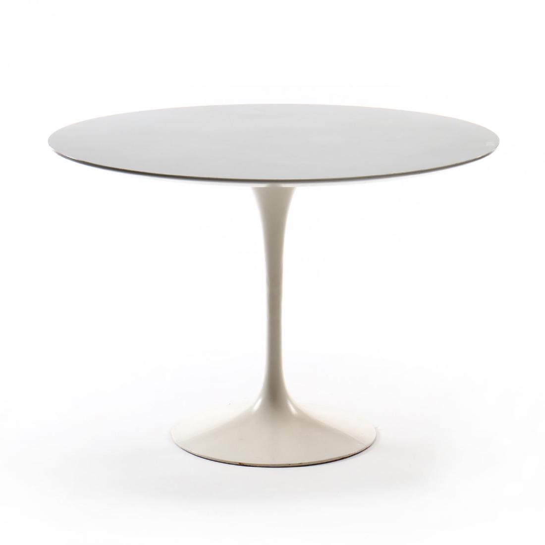 Eero Saarinen (Finnish/American, 1910-1961), Tulip: Knoll, 1950s, white laminate top with enameled aluminum base, unmarked. 29 x 42 in diameter. From the Estate of the late Nicholas and Jeanne Arena, Chapel Hill, NC Nicholas and Jeanne Arena met while 
