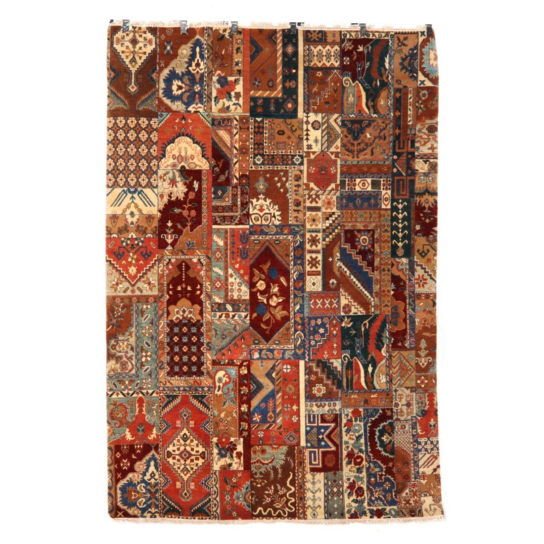Indo Hari Carpet (6 ft. x 8 ft. 3 in.): all over geometric panel decoration in brick red, cornflower blue, beige and coral. This lot to be sold on day 1, Wednesday, October 3 (Lots 1-948) 6 ft. x 8 ft. 3 in. From the Complete and Important 