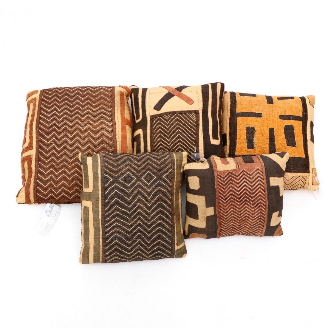 Group of Five Kuba Cloth Pillows: 20th century. This lot to be sold on day 1, Wednesday, October 3 (Lots 1-948) 14 x 14 in. From the Complete and Important Collection of NOA Living, Raleigh, North Carolina Additional high-resolution p