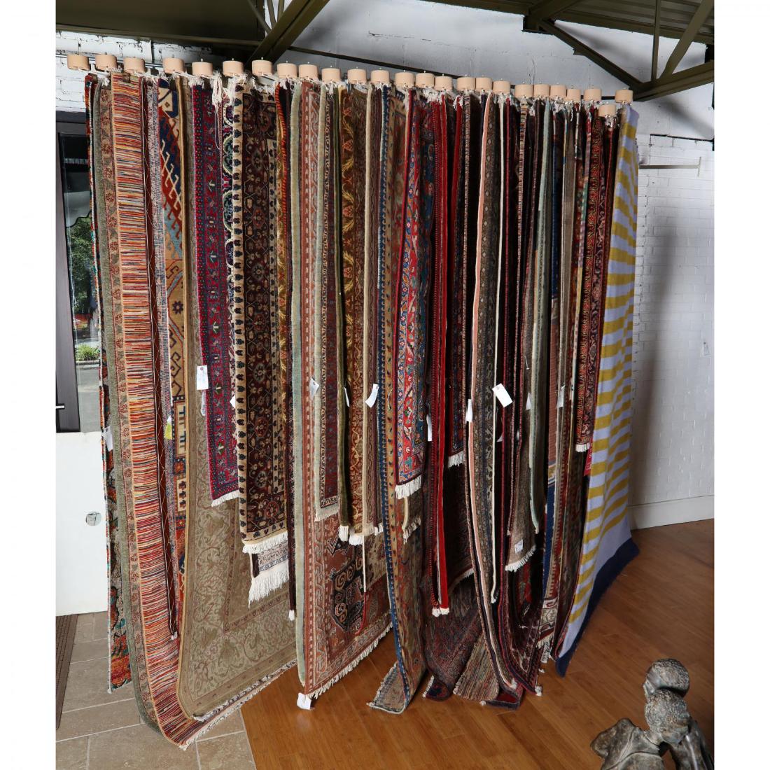 Twenty Five Arm Wall Rug Display (1 of 3)