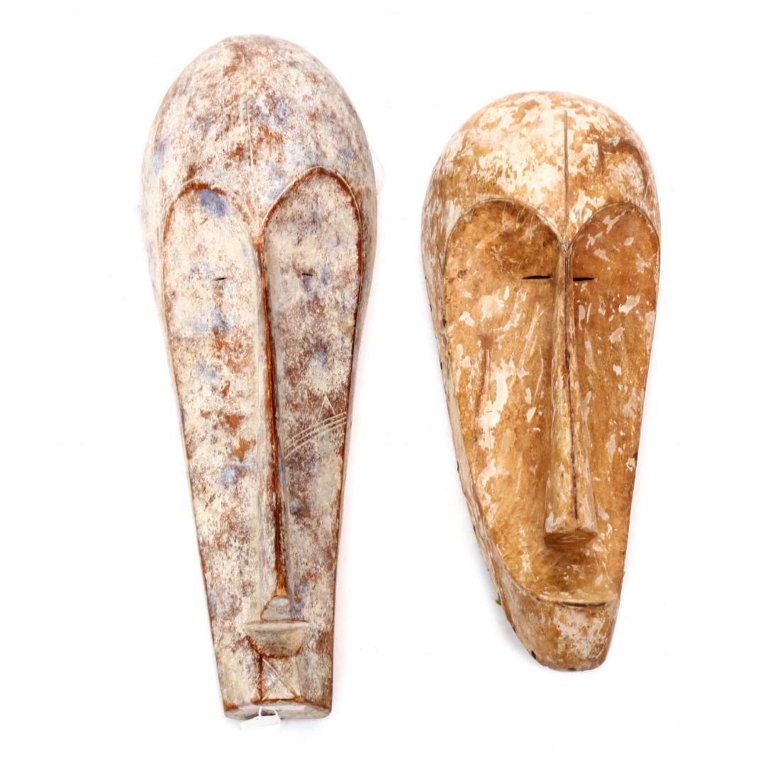 Two Gabon Fang Masks: 20th century, carved and polychromed wood. This lot to be sold on day 1, Wednesday, October 3 (Lots 1-948) 26 in. (the tallest) From the Complete and Important Collection of NOA Living, Raleigh, North