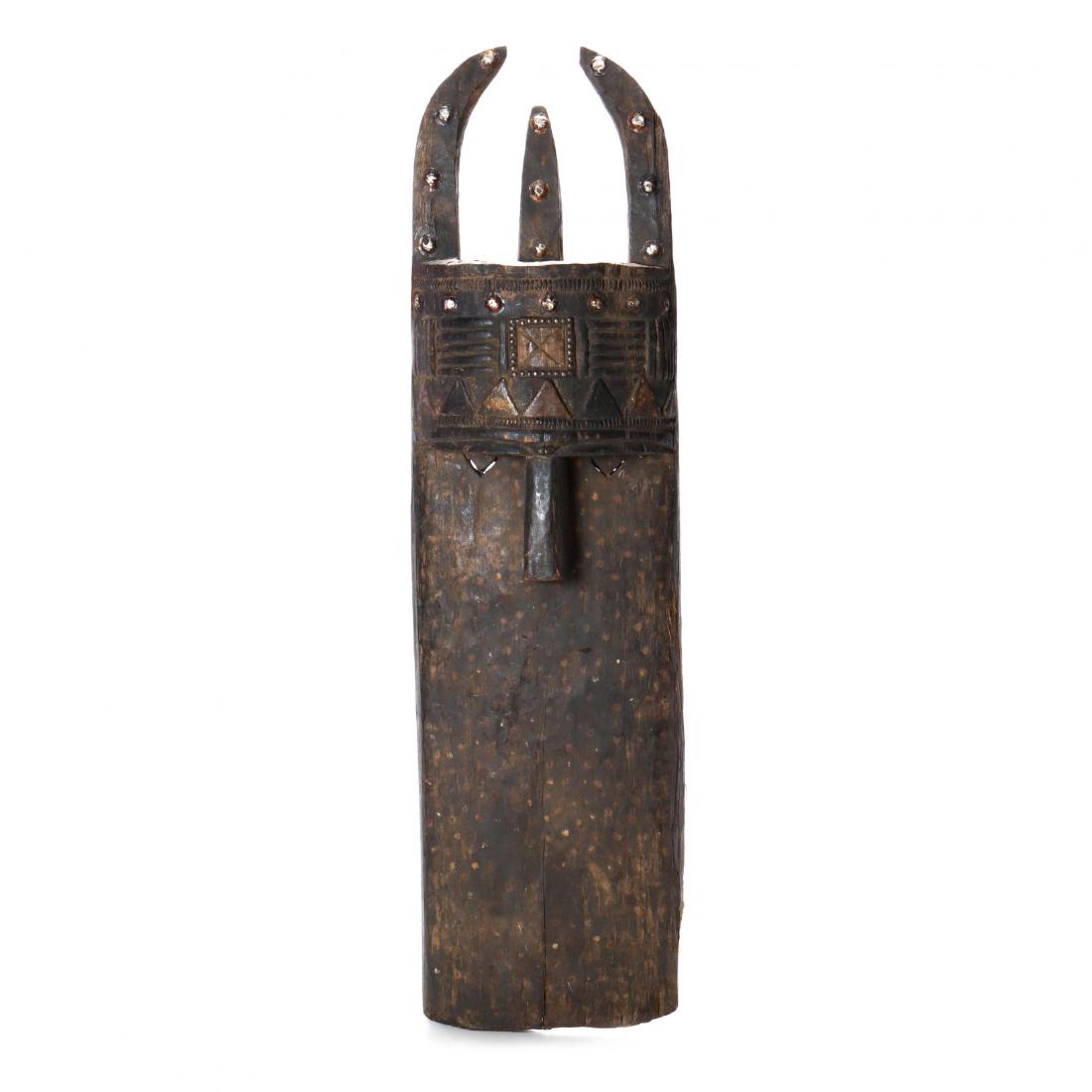 Large Toma Mask: carved hardwood, 20th century, from Liberia. This lot to be sold on day 1, Wednesday, October 3 (Lots 1-948) 63 x 16 in. From the Complete and Important Collection of NOA Living, Raleigh, North Caroli