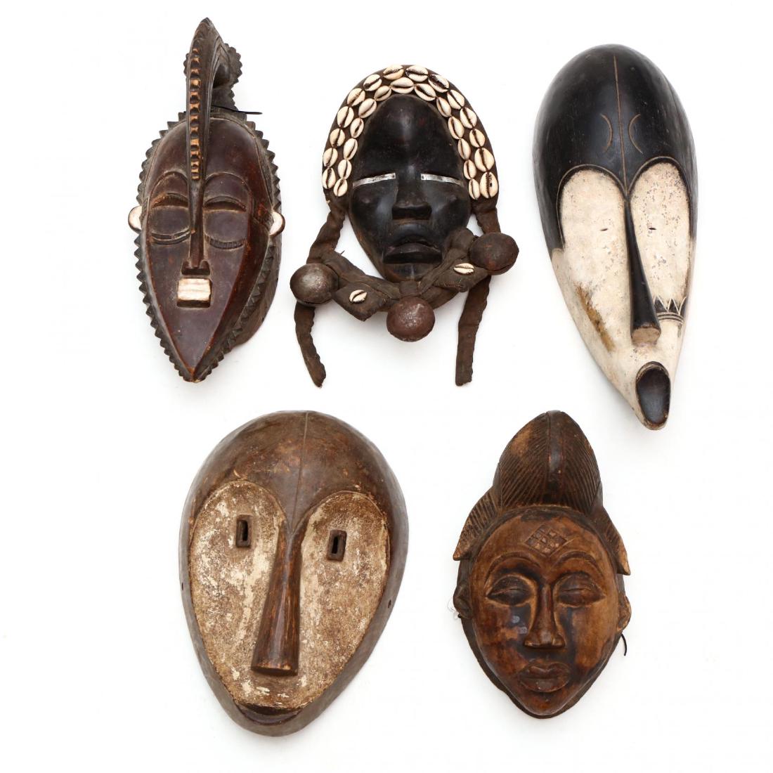 A Group of Five African Tribal Masks (1 of 9)