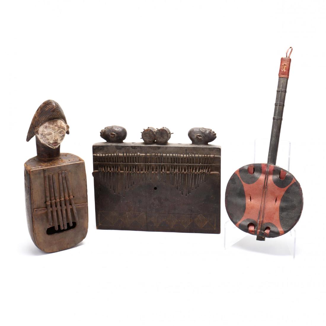 Three African Carved Wood Musical Instruments (1 of 6)