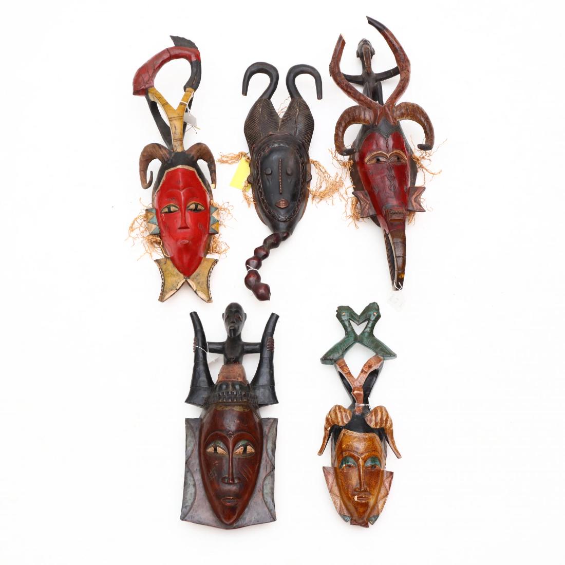 A Group of Five African Baule/Guro Style Masks (1 of 3)