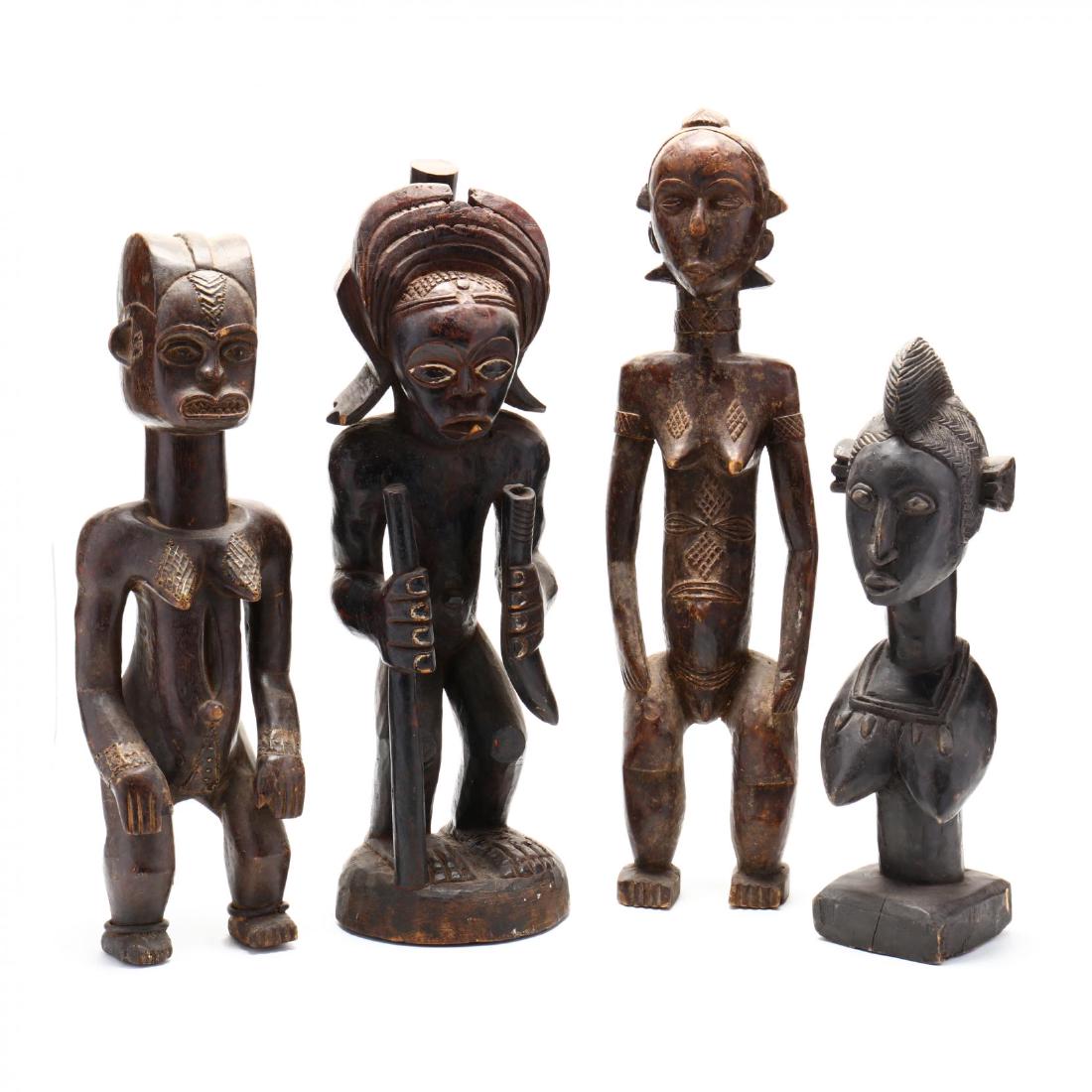 Four Carved African Figures (1 of 4)