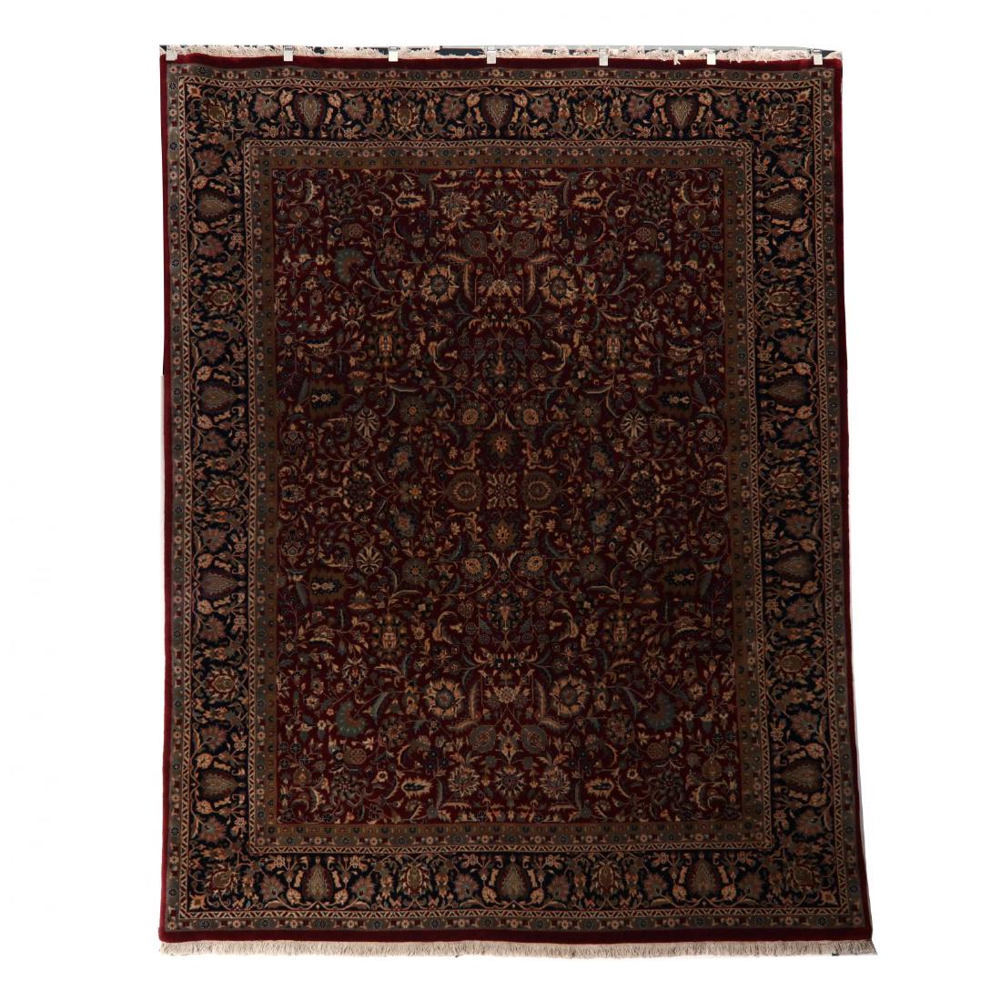 Indo Mughal Room Size Carpet (8 ft. x 10 ft.): dark red field with all over stylized floral motif with blue floral main border. This lot to be sold on day 2, Thursday, October 4 (Lots 949-2020) 8 ft. x 10 ft. From the Complete and Important Collec