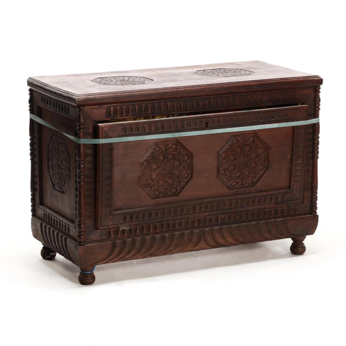 Arabesque Pine Chest: 20th century, lift-top, fold front, with dark stain, raised on turned legs. This lot to be sold on day 2, Thursday, October 4 (Lots 949-2020) 26.5 x 38 x 18 in. From the Complete and Important Collect