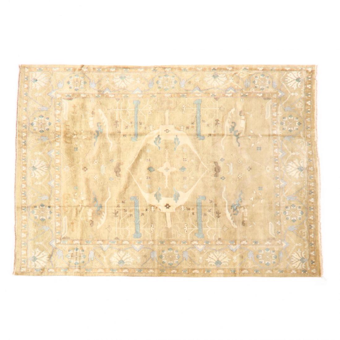 Indo Oushak Room Size Carpet (12 ft 3 in x 14 ft 8 in.: beige field, beige border. This lot to be sold on day 2, Thursday, October 4 (Lots 949-2020) 12 ft 3 in x 14 ft 8 in. From the Complete and Important Collection of NOA Living, Raleigh, North Carolina 