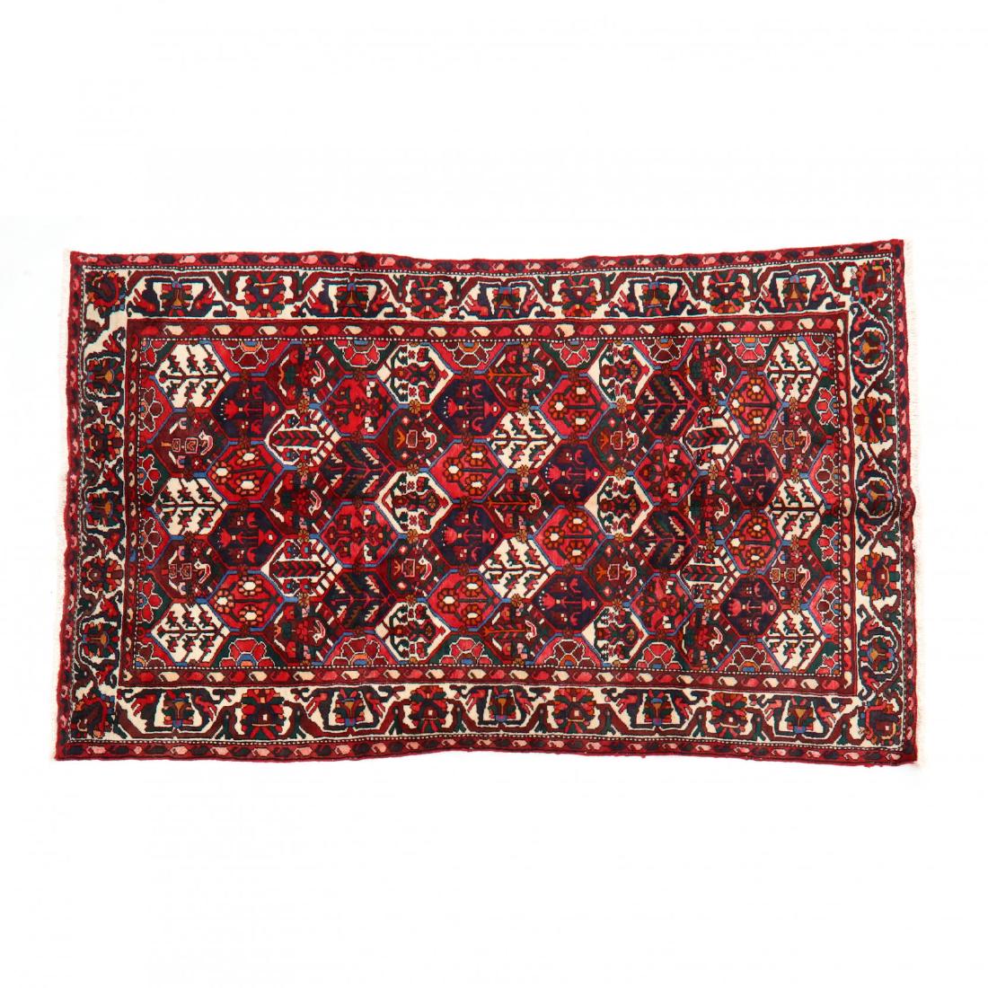 Indo Persian Room Size Carpet (6 ft 4 in x 10 ft 5 in.: multicolor with geometric and floral motifs. This lot to be sold on day 2, Thursday, October 4 (Lots 949-2020) 6 ft 4 in x 10 ft 5 in. From the Complete and Important Collection of NOA Living, Raleig