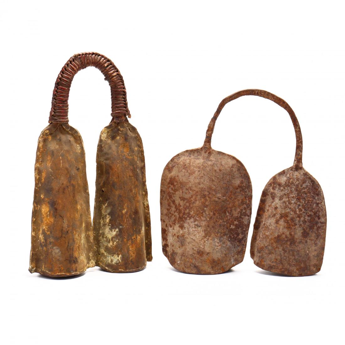 Two Sets of Nigerian Livestock Bells: iron, one with wrapped handle. This lot to be sold on day 2, Thursday, October 4 (Lots 949-2020) Tallest 16 x 9.5 in. From the Complete and Important Collection of NOA Living, Raleigh, North Carolina 