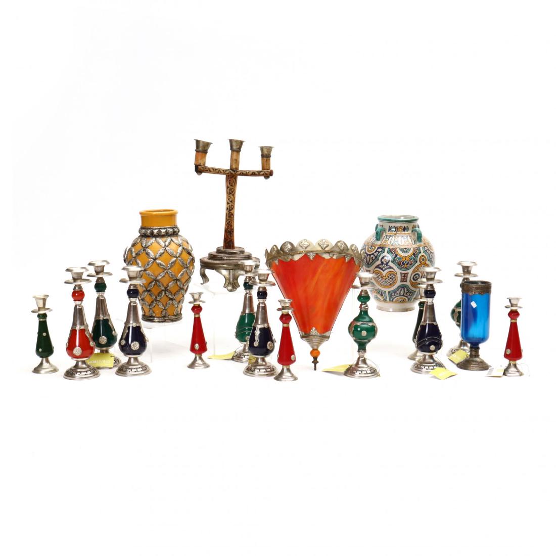 Eighteen Moroccan Decorative Accessories: late 20th century, composition, metal, bone, and pottery, including candlesticks, three vases, and a wall sconce. This lot to be sold on day 3, Friday, October 5 (Lots 2021-2601) Tallest 16 in. From t