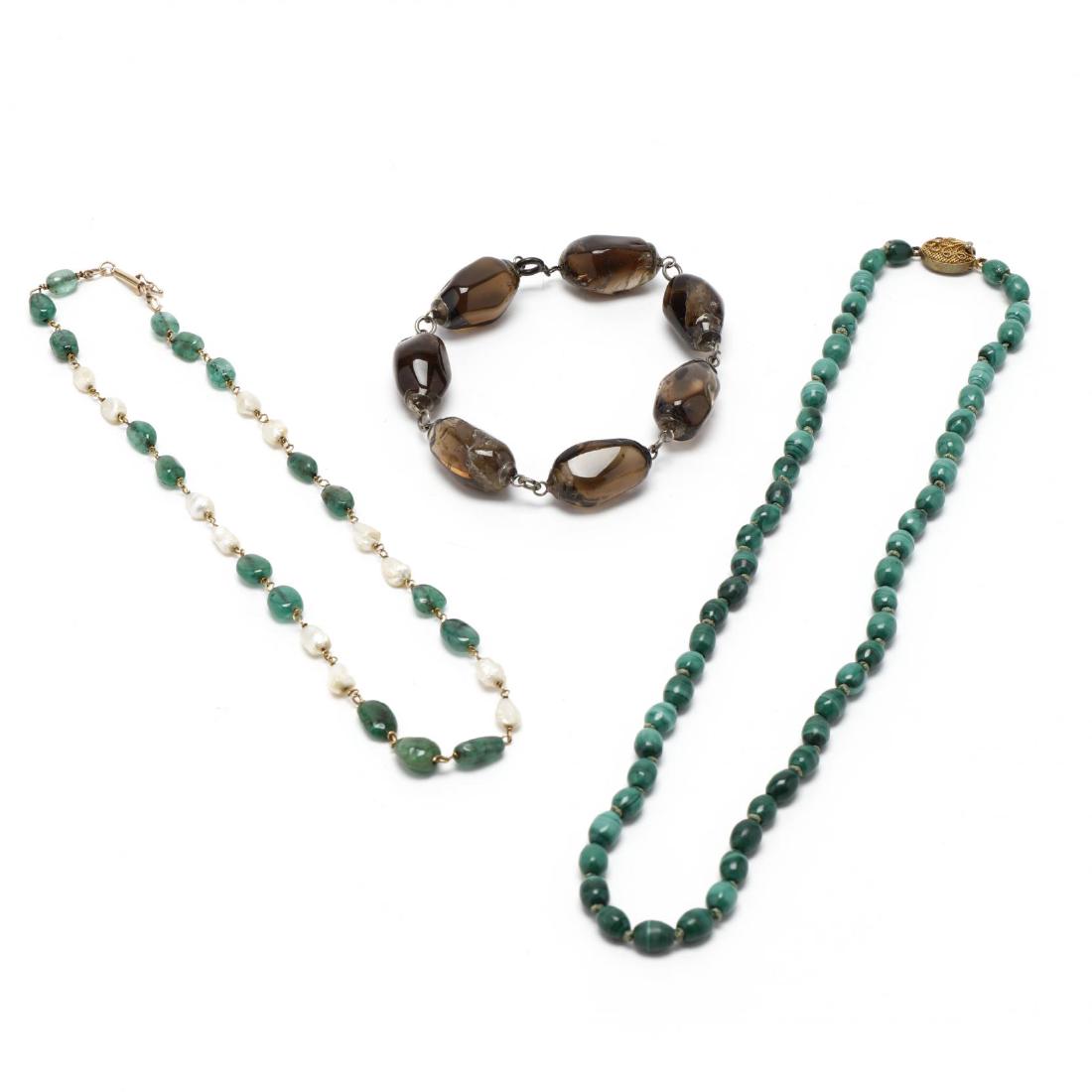 The Gemstone Bead Jewelry Items: The Gemstone Bead Jewelry Itemsa tumbled smoky quartz bead bracelet (stamped STERLING, 8.5 in.); a strung, knotted oval malachite bead necklace with a vermeil clasp (stamped 925, 19 in.); and a tumble