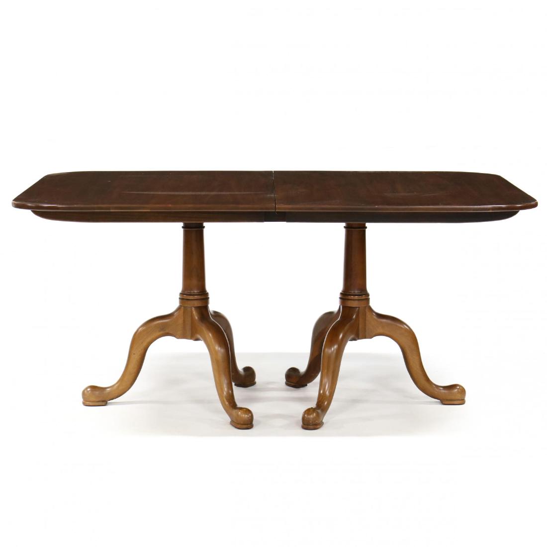 Henkel Harris, Queen Anne Style Walnut Dining Table: Henkel Harris, Queen Anne Style Walnut Dining Tablelate 20th century, rectangular form, opens to accept three leaves, on double pedestal base with cabriole legs, labeled. 31 x 66 x 40 in Each leaf 14