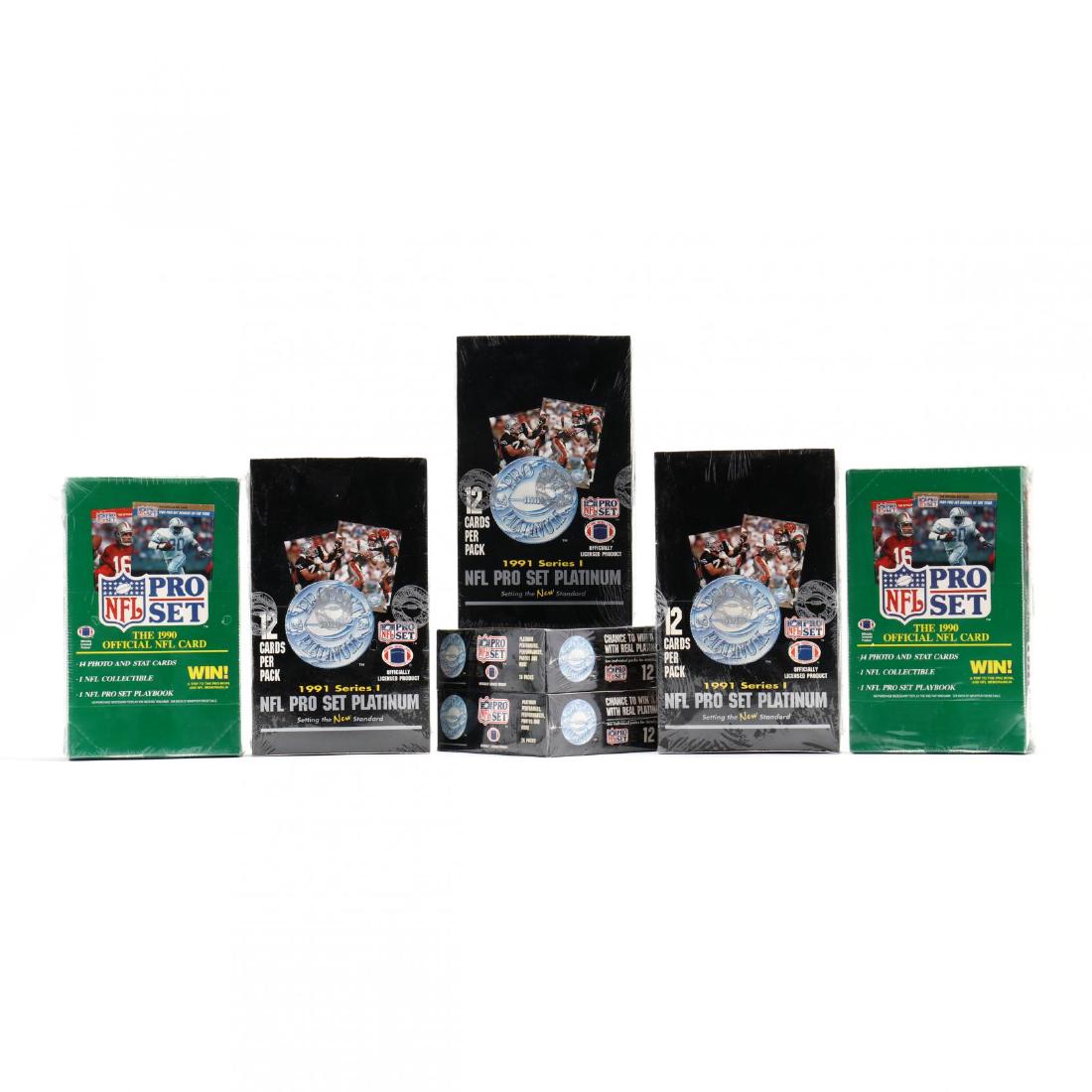 Seven Factory Sealed 1990/91 NFL Pro Card Sets (1 of 4)