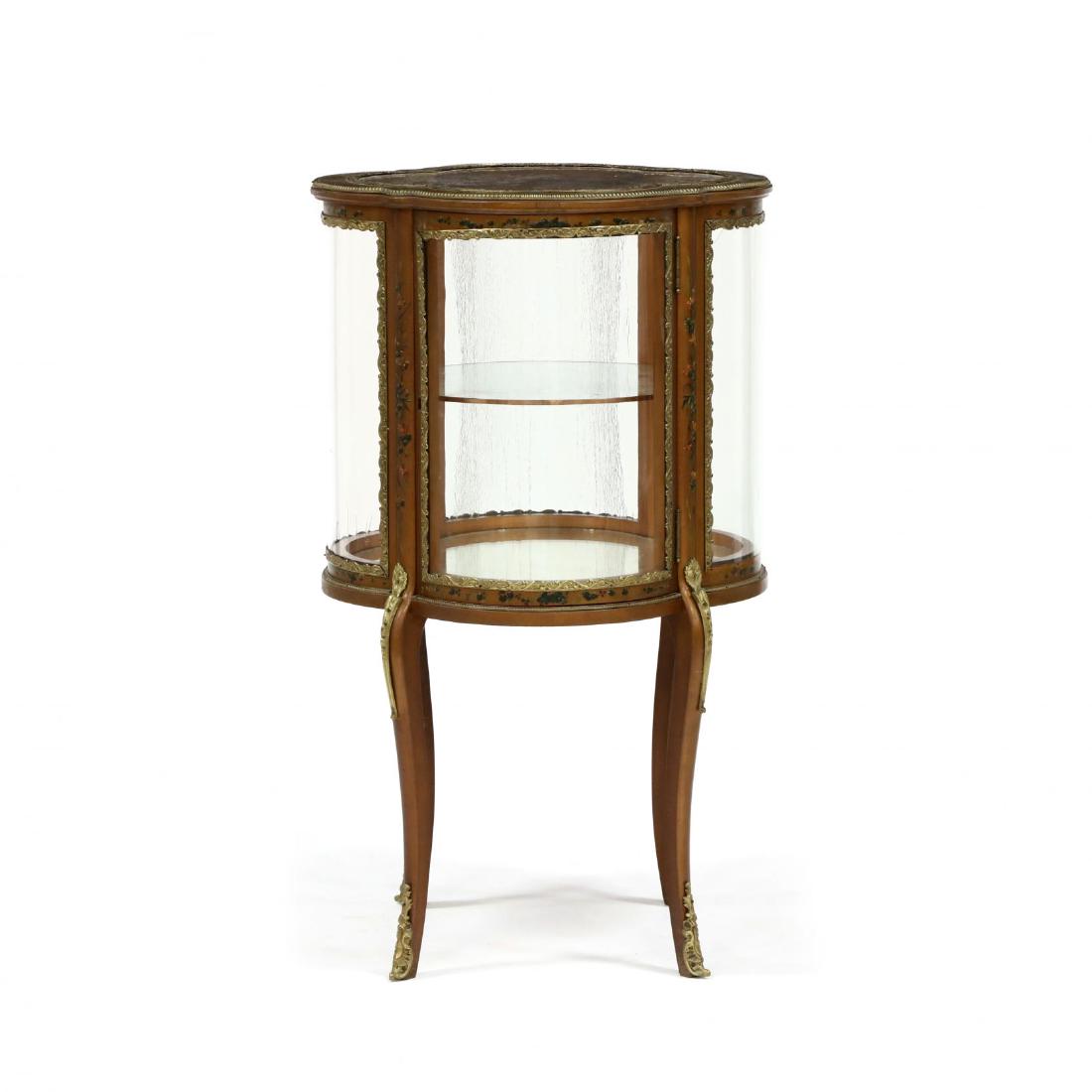 Louis XV Style Paint Decorated Vitrine: Louis XV Style Paint Decorated Vitrine early 20th century, quatrefoil form, surface with gilt ground and floral sprays, hinged door with mirrored and glass shelved interior, on cabriole legs with ormo