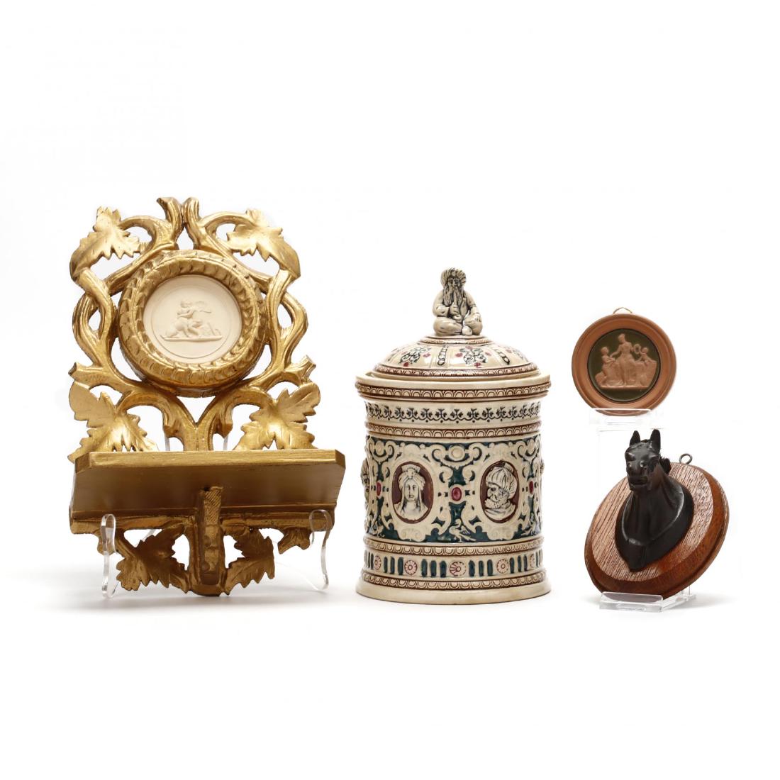 Antique Decorative Accessory Grouping: Antique Decorative Accessory Grouping19th century, including a stoneware humidor; gilt wood wall bracket with Wedgwood plaque; a terra-cotta plaque; and a bronze horse head plaque with real hair mount