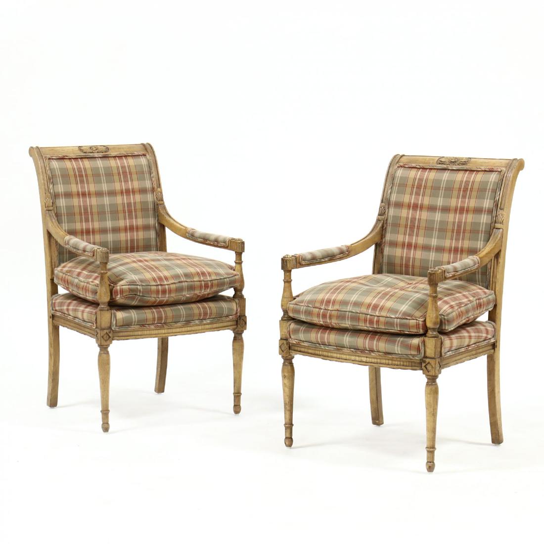 Pair of Louis XVI Style Carved Fauteuil: Pair of Louis XVI Style Carved Fauteuil late 20th century, fruitwood, with carved rosette crestrail, plaid upholstery, with repeating rosettes to knuckle, on turned and tapered legs. 35 x 21 x 19 in. 