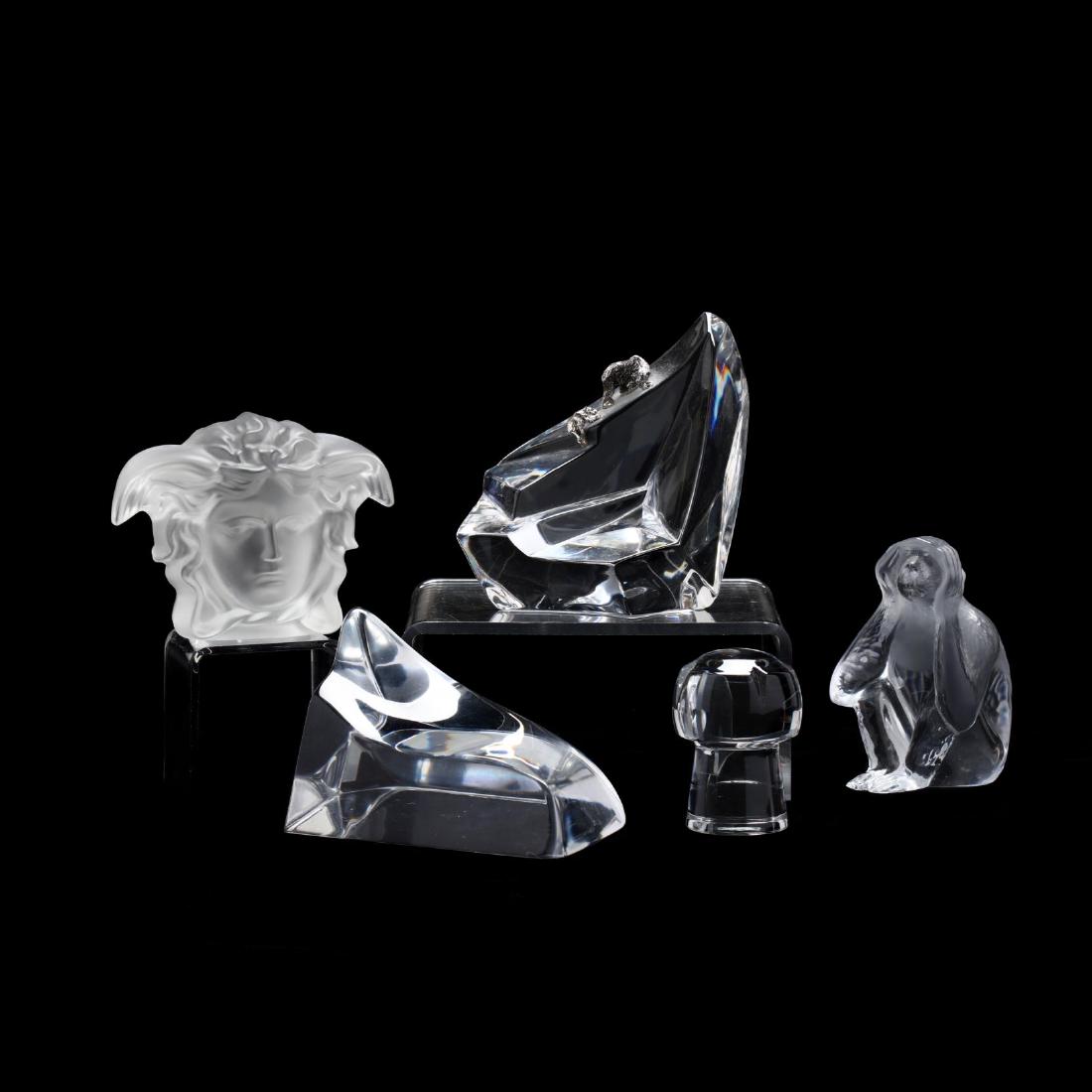 Five Small Crystal Figures: Five Small Crystal Figureslate 20th century, including a Daum monkey; Versace by Rosenthal bust; Franklin Mint polar bear sculpture; and two unmarked pieces. Tallest 4.5 in. The Estate of the late Rus