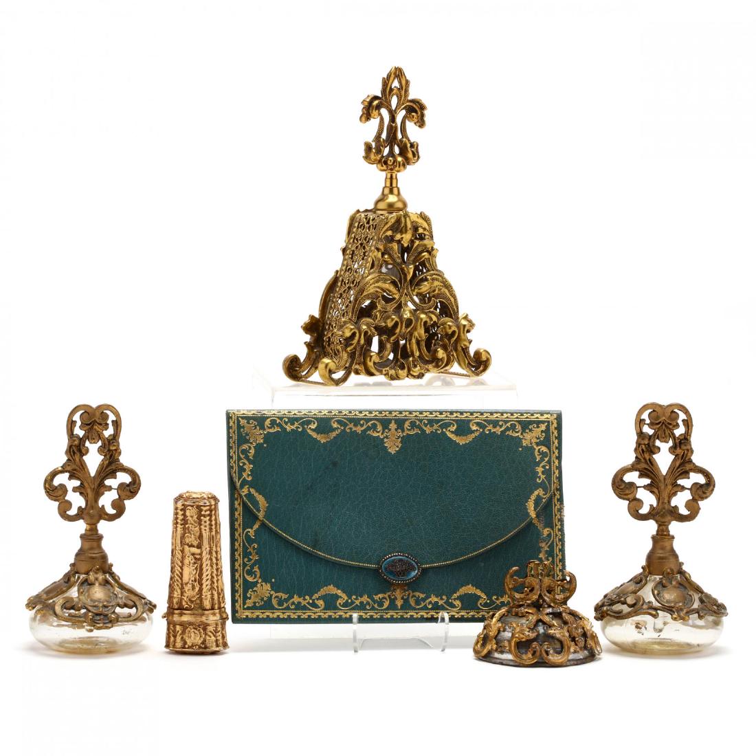 Ladies Boudoir Grouping: Ladies Boudoir Grouping six pieces including for scent bottles, and ormolu mounted bell and a leather calling card case with silver and enamel clasp, unmarked. Tallest 8 in. Private Collection of a La