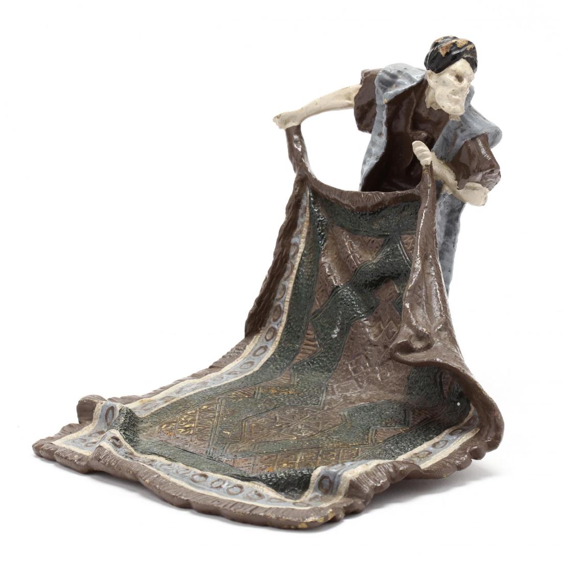 Franz Bergman (Viennese, 1861-1936), Painted Bronze: Franz Bergman (Viennese, 1861-1936), Painted Bronze Carpet Seller early 20th century, later painted surface, marked "Namgreb" to underside. 6 x 6.5 x 9 in. Private Collection of a Lady, Richmond, VA A