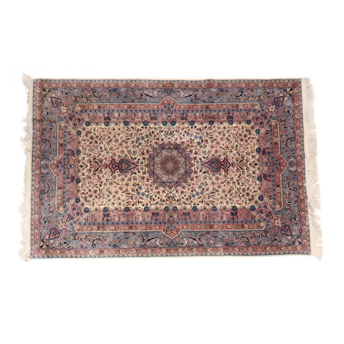 Oriental Rug: Oriental Rug field with pink and blue floral design elements, with light blue guard border. 5 ft. 9 in. x 8 ft. 8 in. Private Collection of a Lady, Richmond, VA Additional high-resolution photos are a