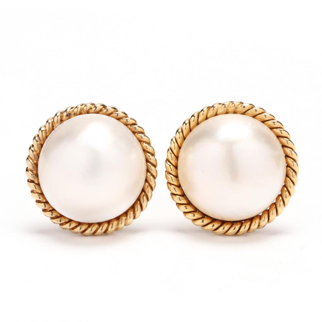 14KT Gold MabÌ© Pearl Earrings, Verdura, with Related: 14KT Gold MabÌ© Pearl Earrings, Verdura, with Related Book bezel set with a MabÌ© pearl (15.80mm) within a rope twist surround, completed with Omega clip backs, one signed Verdura and stamped 14K;