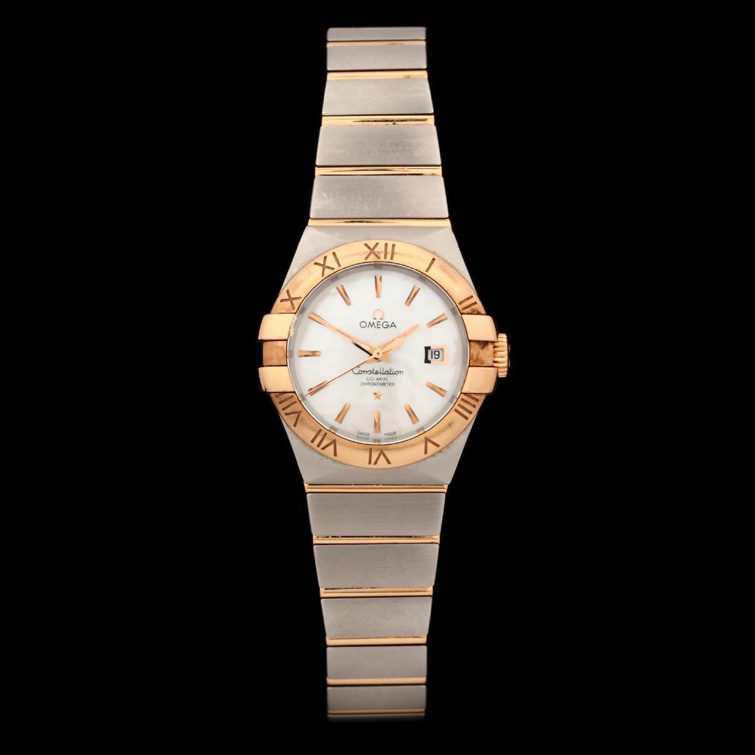 Stainless Steel and Gold "Constellation Co-Axial: Stainless Steel and Gold "Constellation Co-Axial Chronograph" Watch, Omega manual and self-winding, with 28 jewels, the stainless steel case with gold bezel engraved with Roman numeral hour markers, t