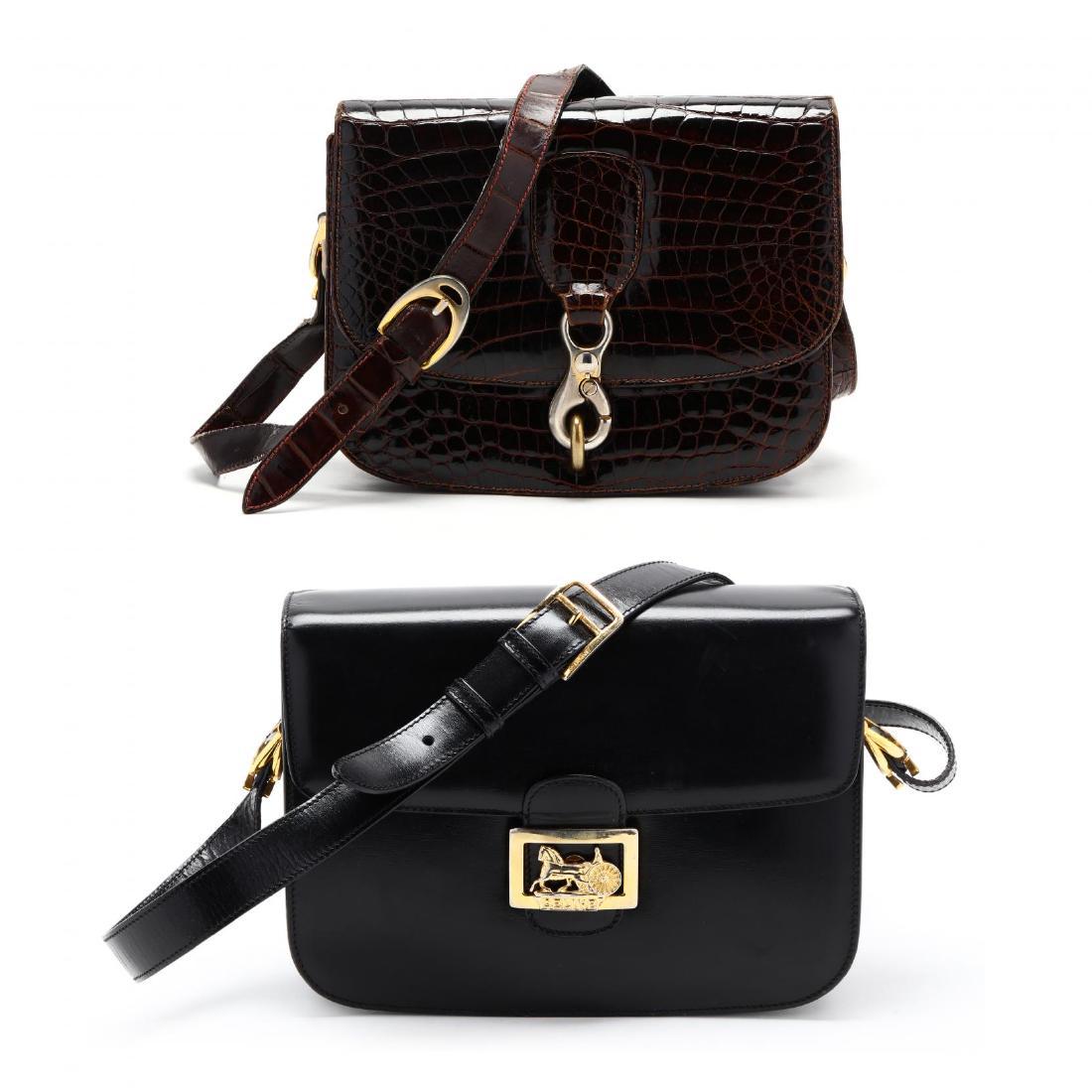 Two Vintage Box Handbags, Celine: Two Vintage Box Handbags, Celinemade in Italy, the first is a black calfskin Horse and Carriage cross-body bag, the flap front opens to reveal a red leather interior of three open compartments with se