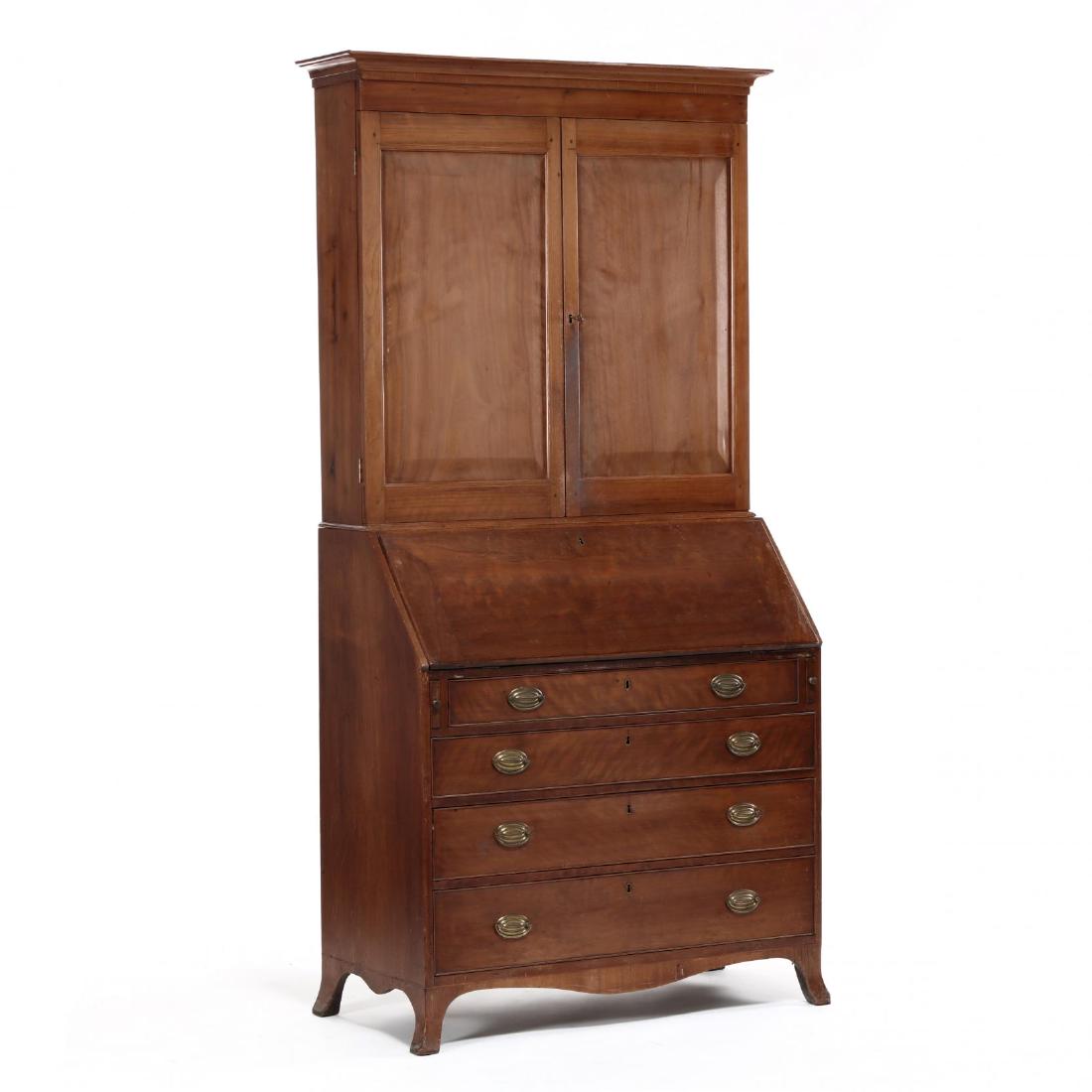 Southern Federal Walnut Inlaid Secretary Bookcase: Southern Federal Walnut Inlaid Secretary Bookcase Virginia or North Carolina, circa 1800, white pine secondary, two-part form, top having a dovetailed case with applied cove molded cornice featuring v