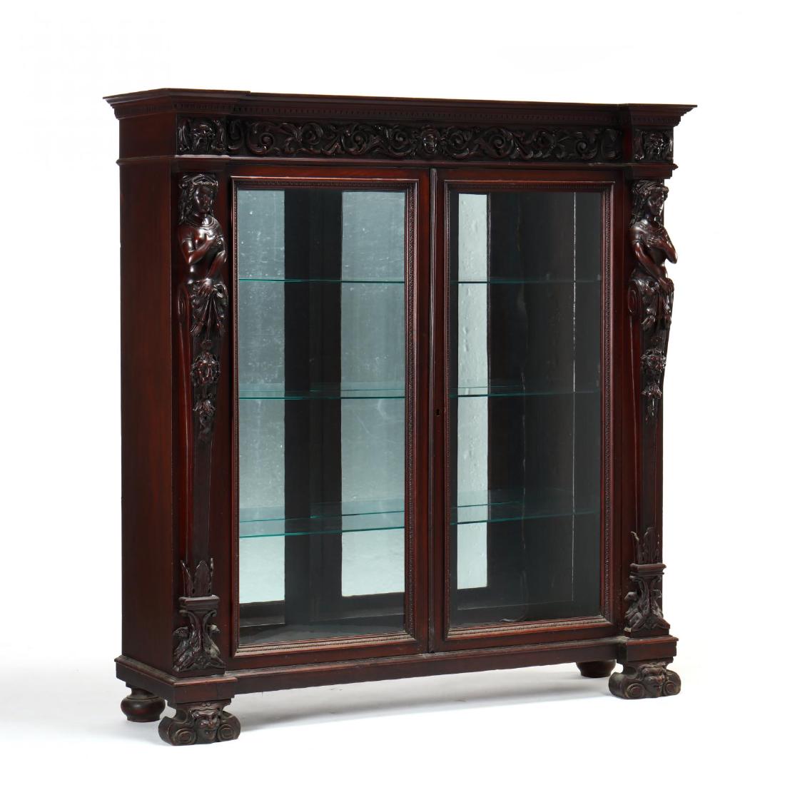 American Renaissance Revival Carved BibliothÌ¬que, att.: American Renaissance Revival Carved BibliothÌ¬que, att. R. J. Horner New York, stenciled mark "1253" to back, unsigned, mahogany, late 19th century, rectangular one-piece case, with applied molded c