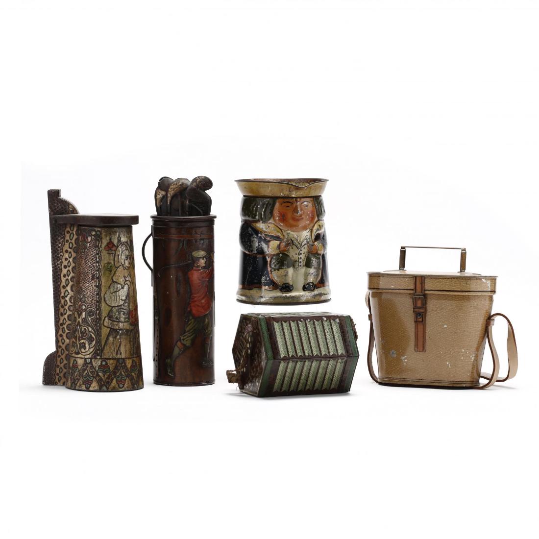 A Group of Five Leisure Activity Biscuit Tins: A Group of Five Leisure Activity Biscuit Tins early 20th century, tin litho, a William Crawford flip top tankard (rusting) (10.25 in.); a Huntley & Palmer Toby tankard (paint losses); Macfarlane golf 