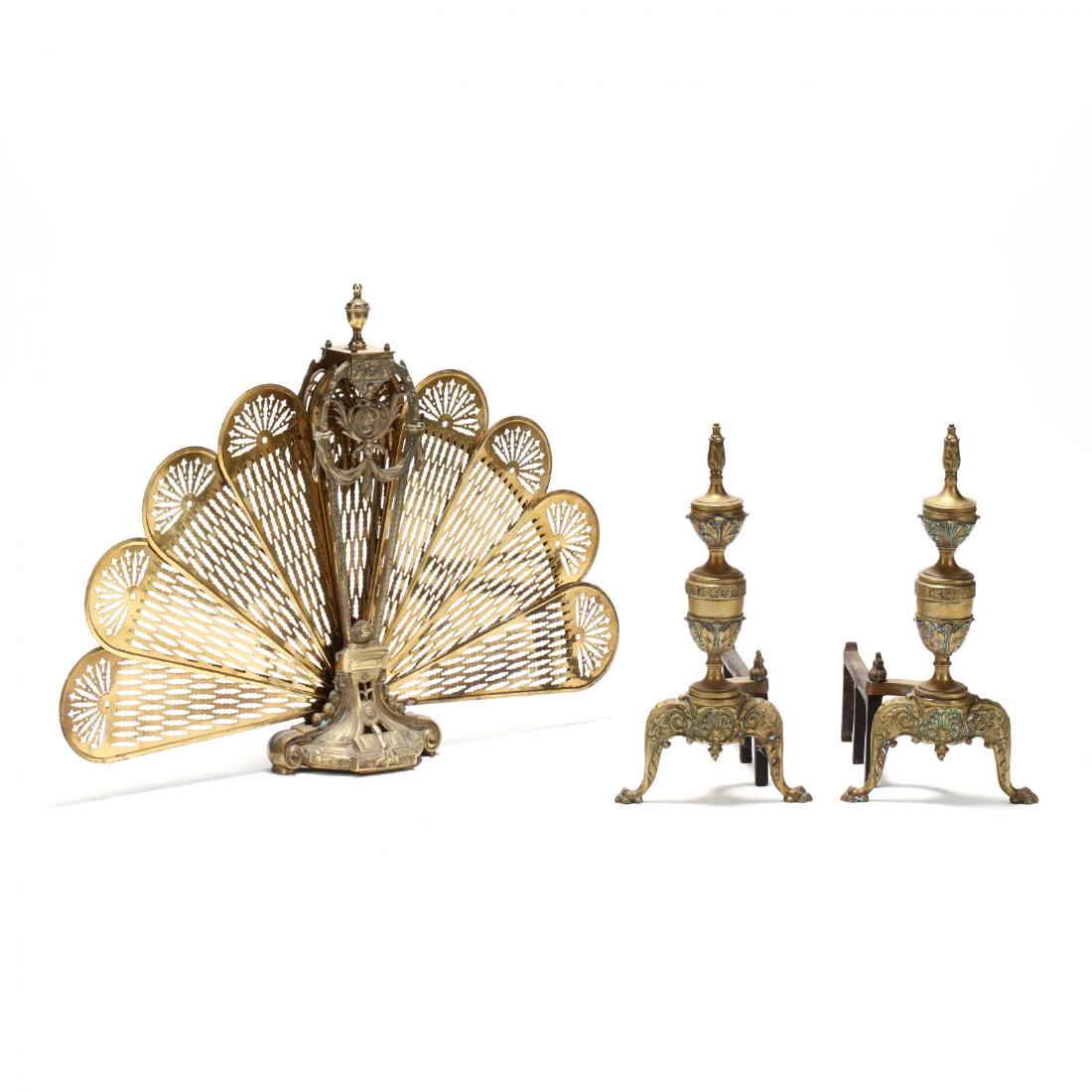 French Empire Style Brass Andirons and Firescreen: French Empire Style Brass Andirons and Firescreen mid 20th century, including a peacock form folding fire screen with cameo and swag motif; and a pair of similar urn form andirons with bellflower and 