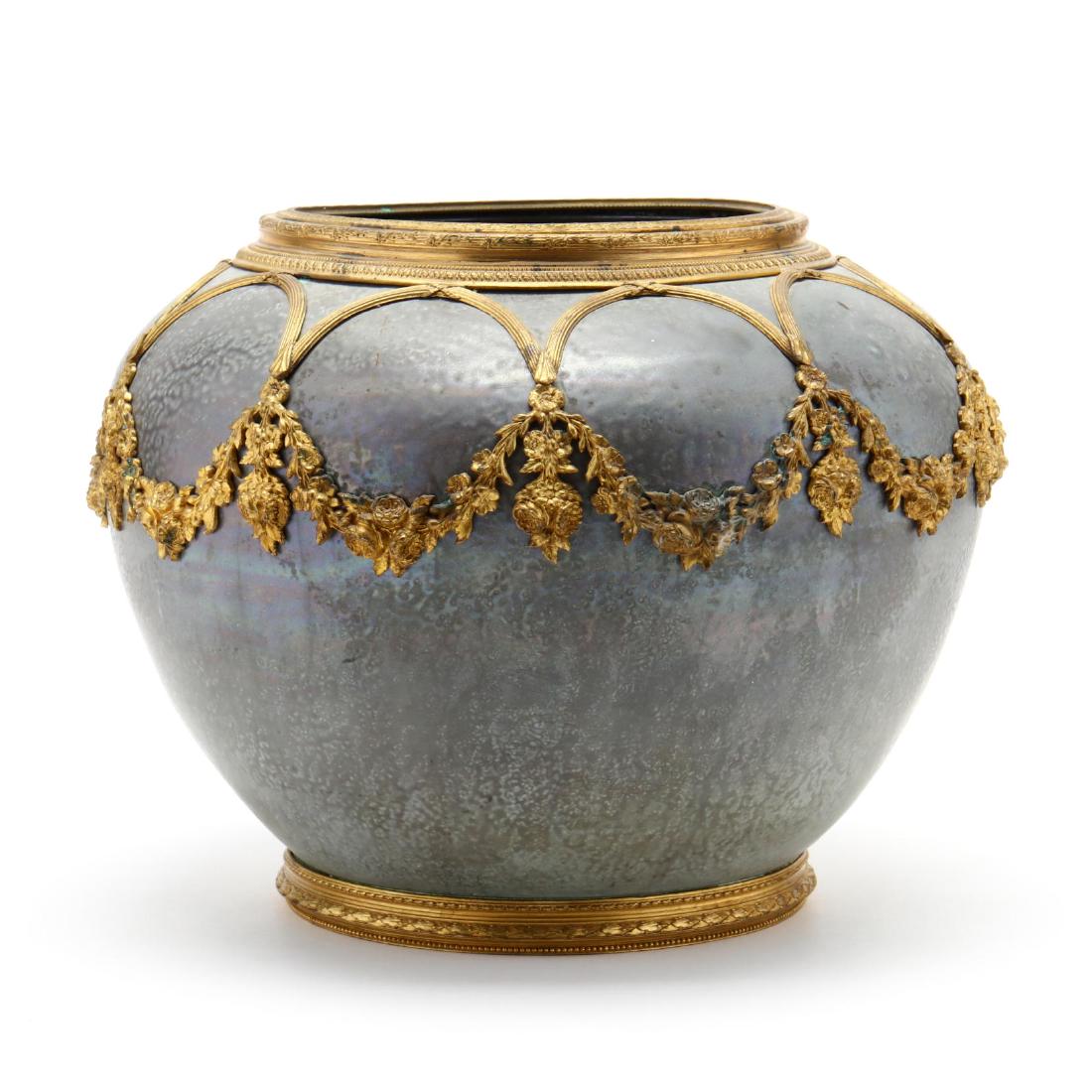 Paul Daschel, Turn-Teplitz Amphora and Gilt Bronze Vase: Paul Daschel, Turn-Teplitz Amphora and Gilt Bronze Vase early 20th century, grey matte glaze with slight iridescence, overlay of gilt bronze floral swags, with gilt rim and foot rim, label to undersid