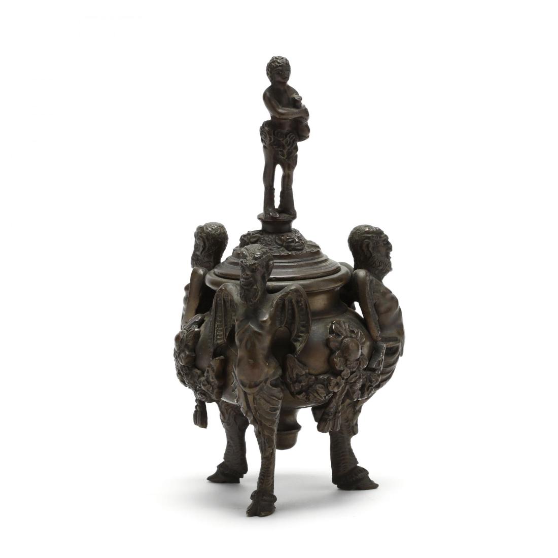 Continental Bronze Lidded Censer: Continental Bronze Lidded Censer late 19th century, lidded form with a figural finial, tripod base with winged devil caryatids on hoof feet, unmarked. 7.5 in. Additional high-resolution photos are ava