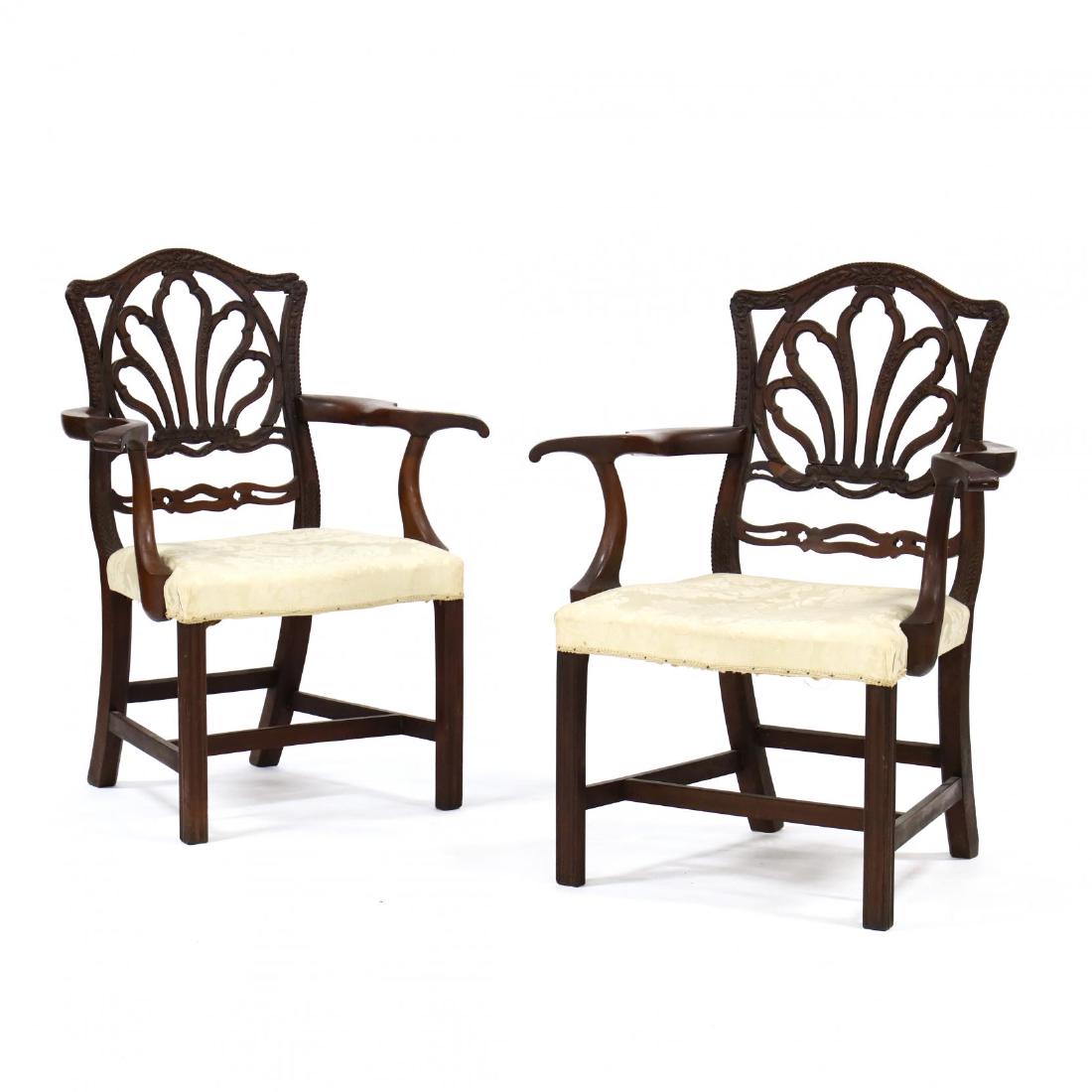 Pair of George III Carved Mahogany Armchairs: Pair of George III Carved Mahogany Armchairs late 18th century, arched crestrail with rope twist edge, reticulated shell back with bellflower and scroll carving, later gold damask over upholstered ser