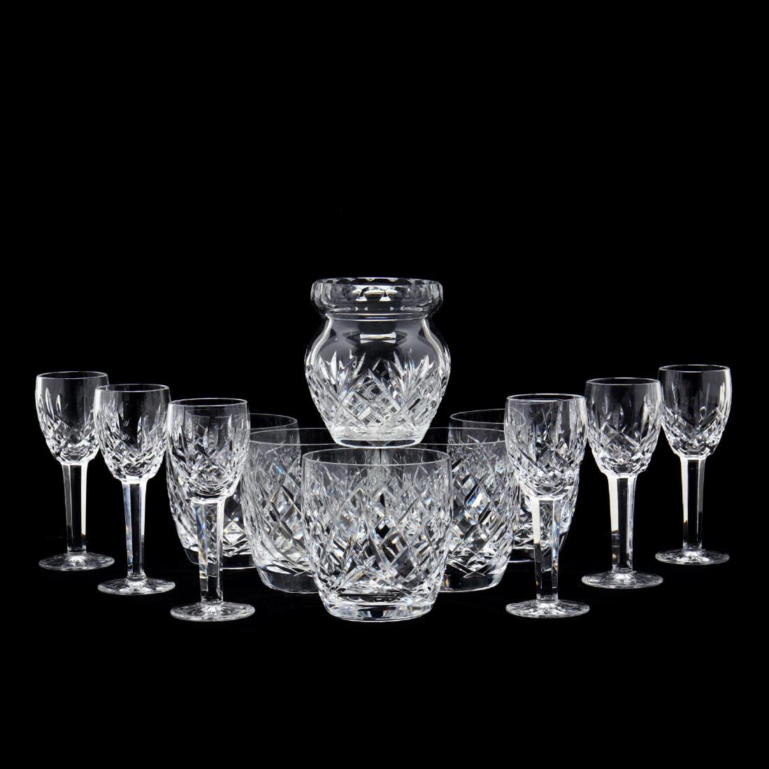 Waterford Crystal Barware: Waterford Crystal Barware (12) pieces including: a set of (6) "Lismore" liqueurs, a set of (5) old fashioneds, and a vase. The vase is unsigned and not Waterford. From the Collection of Carolyn Connor