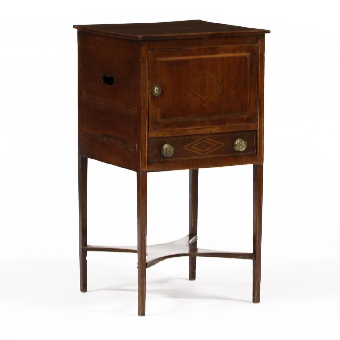 George III Inlaid Mahogany Necessary Stand: George III Inlaid Mahogany Necessary Stand late 18th century, oak secondary, top with light line banded and diamond inlay, with repeating inlays to hinged cabinet door and drawer front, featuring a lo